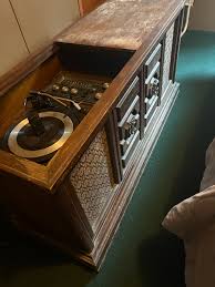 this is a stereo my moms mom had,its in decent shape for the ...