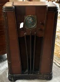 Lot - Art Deco Silvertone floor model radio.