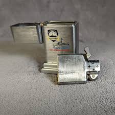 1950s Zippo Barcroft table lighter featuring the USS Rexburg ...